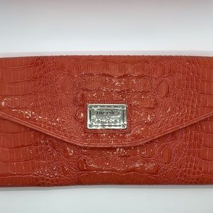 Orange Patent Orange Clutch Nicole Miller